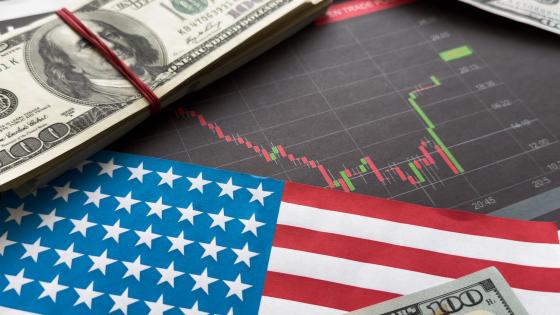 US dollars, US flag and financial chart