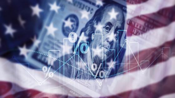 US flag, dollars and financial chart