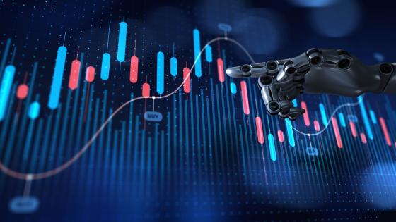 Robot hand pointing to financial chart