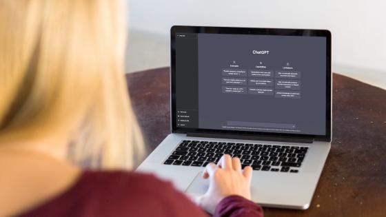 Student using ChatGPT on laptop