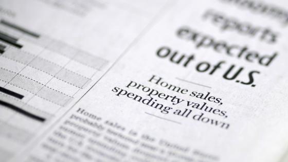 Newspaper headline about economy